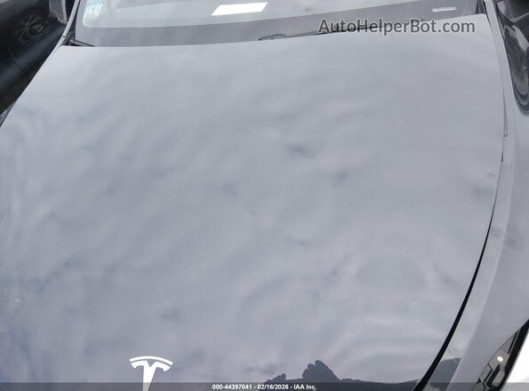 7SAYGAEE3RF009589 2024 TESLA MODEL Y Black Rear view