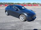 2024 Tesla Model Y Long Range Dual Motor All-wheel Drive Gray vin: 7SAYGAEE4RF029320