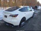 2025 Tesla Model Y Long Range Dual Motor All-wheel Drive White vin: 7SAYGAEE9SF262471