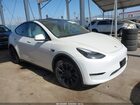 2023 Tesla Model Y Awd/long Range Dual Motor All-wheel Drive Белый vin: 7SAYGAEEXPF800652