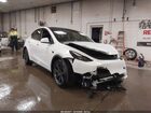 2024 Tesla Model Y Long Range Dual Motor All-wheel Drive White vin: 7SAYGAEEXRF214729