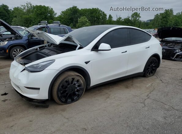7SAYGDED1RF094232 2024 TESLA MODEL White Առջևի ձախ երեք քառորդ տեսարան