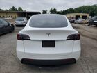 2024 Tesla Model Y White vin: 7SAYGDED1RF094232