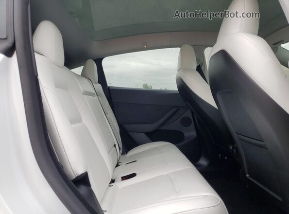 7SAYGDED1RF094232 2024 TESLA MODEL White Հետևի նստատեղերի տեսք