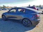 2024 Tesla Model Y Gray vin: 7SAYGDED6RF103183