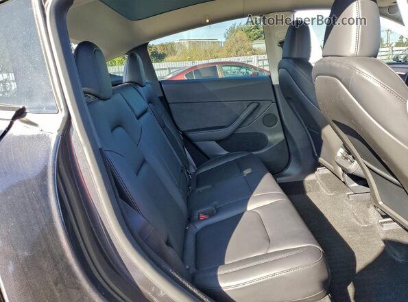 7SAYGDED6RF103183 2024 TESLA MODEL Gray Вид задніх сидінь