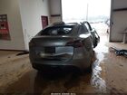 2025 Tesla Model Y Long Range Dual Motor Rear-wheel Drive Gray vin: 7SAYGDED6SA363697