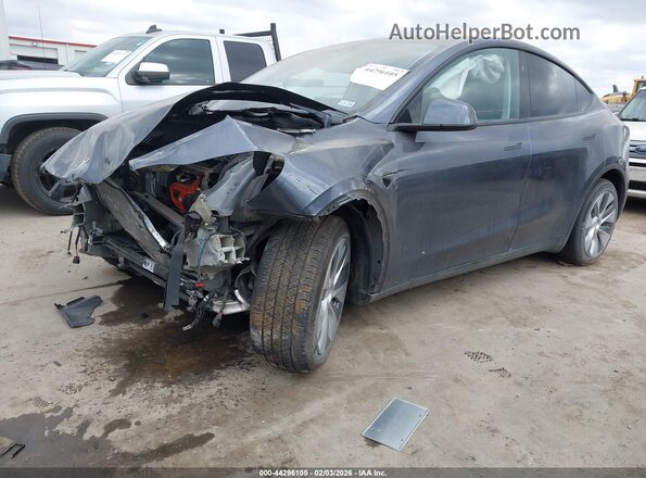 7SAYGDED8PF960702 2023 TESLA MODEL Y Gray Przód lewy