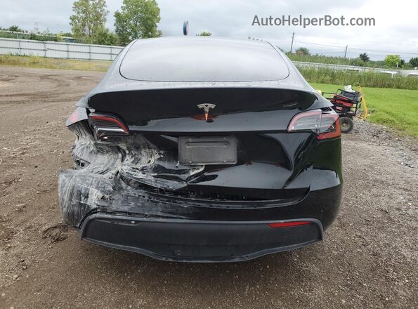 7SAYGDED8SF247954 2025 TESLA MODEL Black Vista trasera