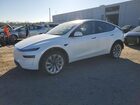 2026 Tesla Model Y White vin: 7SAYGDED9TA500973