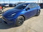 2025 Tesla Model Y Blue vin: 7SAYGDEDXSF227916