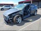 2022 Tesla Model Y Long Range Dual Motor All-wheel Drive Gray vin: 7SAYGDEE1NF454652