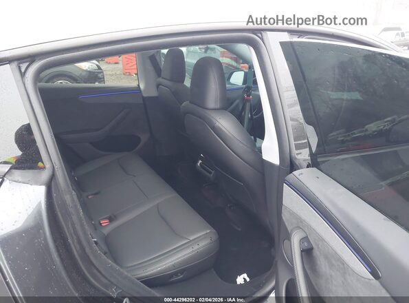 7SAYGDEE1TA587485 2026 TESLA MODEL Y Black VIN კოდის სტიკერის ხედი