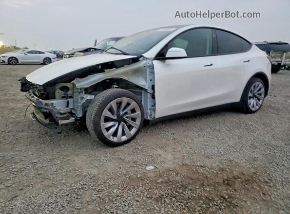 7SAYGDEE3TF353531 2026 TESLA MODEL White წინა მარცხენა ხედი სამი მეოთხედიდან