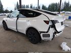 2024 Tesla Model Y Long Range Dual Motor All-wheel Drive White vin: 7SAYGDEE6RF155504