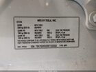 2024 Tesla Model Y Long Range Dual Motor All-wheel Drive White vin: 7SAYGDEE6RF155504