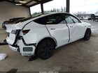 2024 Tesla Model Y Long Range Dual Motor All-wheel Drive White vin: 7SAYGDEE6RF155504