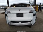 2024 Tesla Model Y Long Range Dual Motor All-wheel Drive White vin: 7SAYGDEE6RF155504