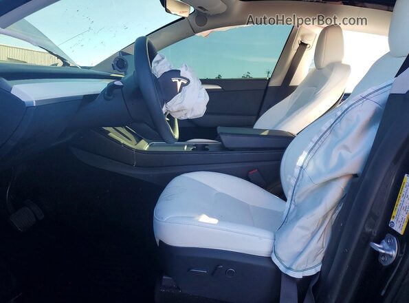 7SAYGDEE7RF986512 2024 TESLA MODEL Gray Вид салону спереду
