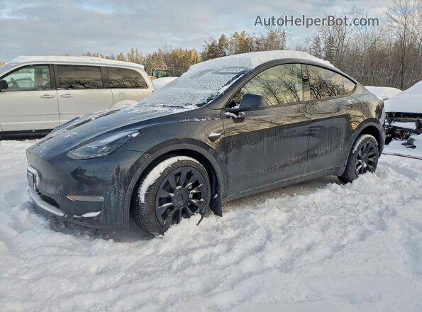 7SAYGDEE7SF275673 2025 TESLA MODEL Charcoal Vista tres cuartos delantera izquierda