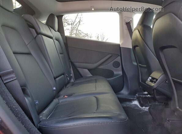 7SAYGDEE7SF275673 2025 TESLA MODEL Charcoal Vista interior trasera