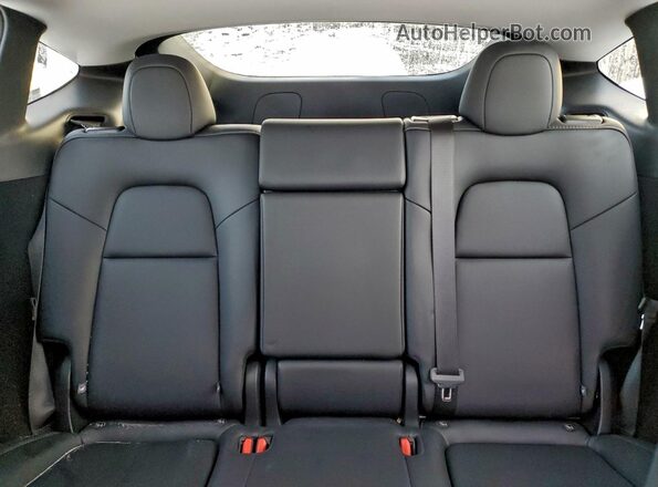 7SAYGDEE7SF275673 2025 TESLA MODEL Charcoal Vista de los asientos traseros