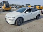 2026 Tesla Model Y White vin: 7SAYGDEE8TA390345