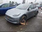 2024 Tesla Model Y Long Range Dual Motor All-wheel Drive Gray vin: 7SAYGDEE9RA299951