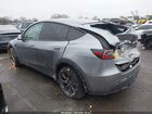 2024 Tesla Model Y Long Range Dual Motor All-wheel Drive Gray vin: 7SAYGDEE9RA299951
