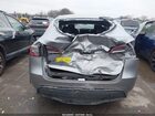 2024 Tesla Model Y Long Range Dual Motor All-wheel Drive Gray vin: 7SAYGDEE9RA299951