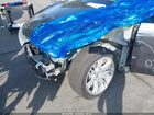 2024 Tesla Model Y Long Range Dual Motor All-wheel Drive Gray vin: 7SAYGDEE9RF068891