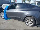 2024 Tesla Model Y Long Range Dual Motor All-wheel Drive Gray vin: 7SAYGDEE9RF068891