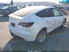 2023 Tesla Model Y Awd/long Range Dual Motor All-wheel Drive White vin: 7SAYGDEEXPF624848