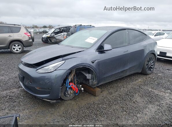 7SAYGDEF7NF374104 2022 TESLA MODEL Y Gray Առջևի ձախ երեք քառորդ տեսարան