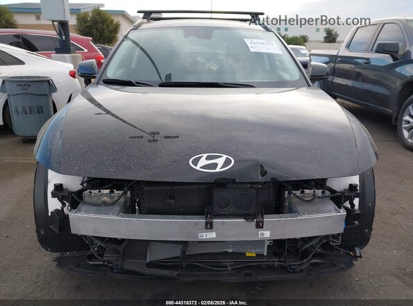 7YAKN4DAXSY033301 2025 HYUNDAI IONIQ 5 Черный Вид задней части салона