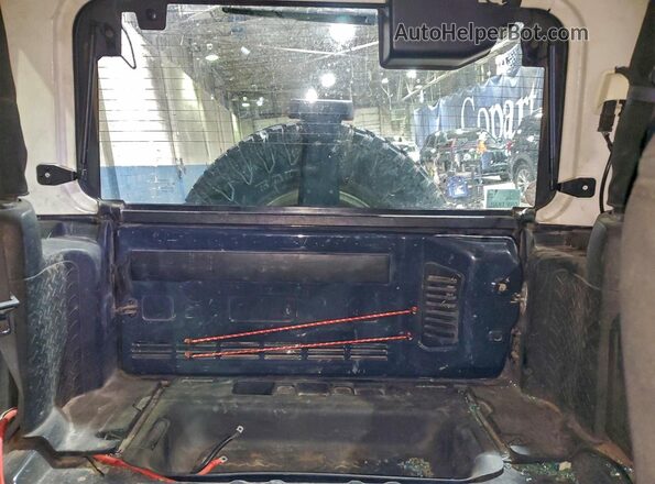 1C4AJWAG2JL801187 2018 JEEP WRANGLER Черный Вид задней части салона