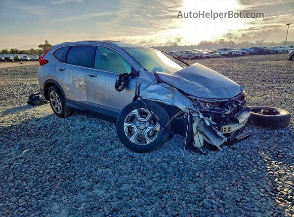 5J6RW1H86KA023117 2019 HONDA CRV Серебряный Вид спереди