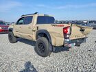 2019 Toyota Tacoma Double Cab Золотой vin: 3TMCZ5ANXKM198077