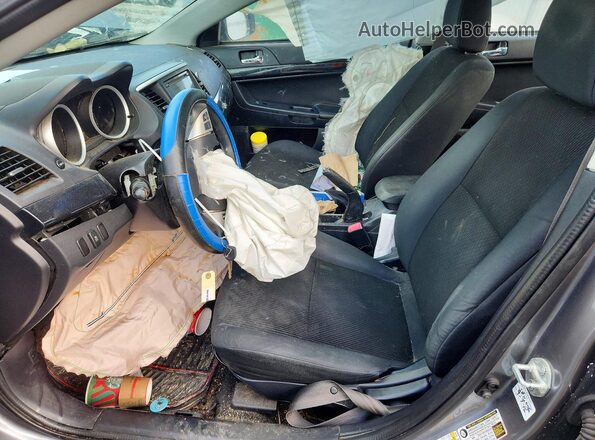 JA32U2FU9GU001054 2016 MITSUBISHI LANCER Серый Вид салона спереди