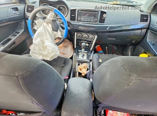 JA32U2FU9GU001054 2016 MITSUBISHI LANCER Серый Вид панели приборов