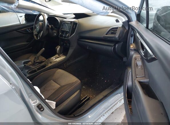 JF2GTACC5KH231273 2019 SUBARU CROSSTREK Light Blue Вид салона спереди