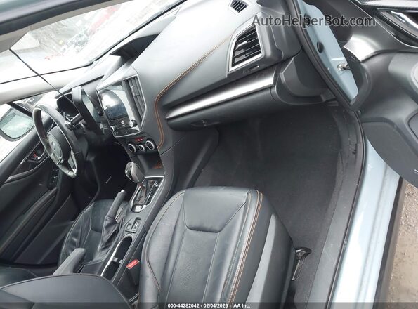 JF2GTANC6LH273529 2020 SUBARU CROSSTREK Light Blue Вид салона спереди