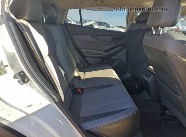 JF2GTHSC7NH278299 2022 SUBARU CROSSTREK White Vista interior trasera