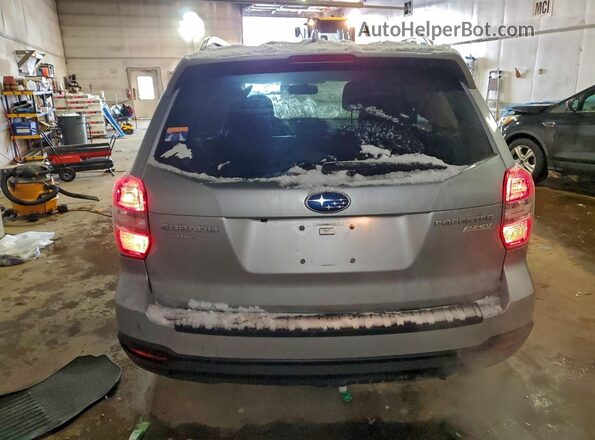 JF2SJAHCXGH515630 2016 SUBARU FORESTER 2.5 Серебряный Вид сзади