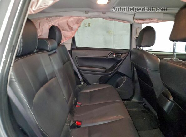 JF2SJAHCXGH515630 2016 SUBARU FORESTER 2.5 Серебряный Вид задней части салона
