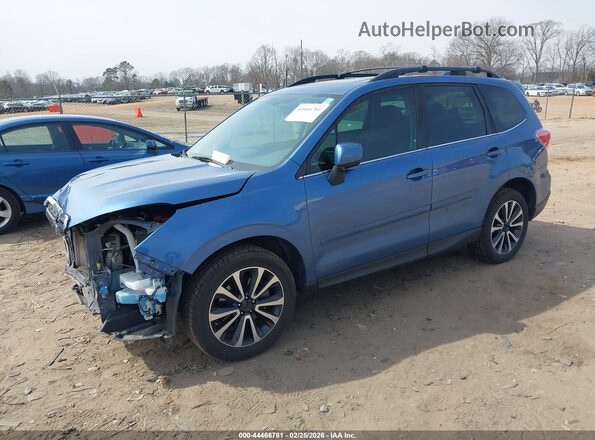 JF2SJGEC3JH414802 2018 SUBARU FORESTER2. Синий Передняя левая четверть