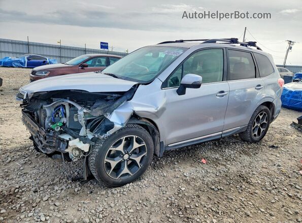 JF2SJGVC9GH412495 2016 SUBARU FORESTER2. Silver Vista tres cuartos delantera izquierda