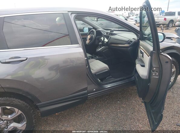 JHLRW2H59KX022304 2019 HONDA CR-V Серый Вид салона спереди