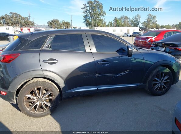JM1DKDD7XG0134115 2016 MAZDA CX-3 Gray Widok wnętrza z tyłu