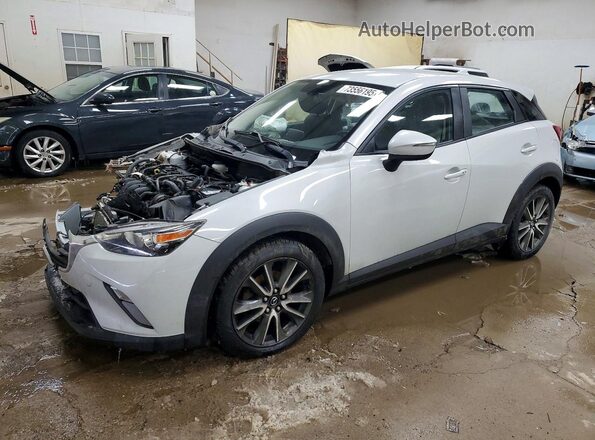 JM1DKFC72H0161887 2017 MAZDA CX-3 Gray Vista tres cuartos delantera izquierda